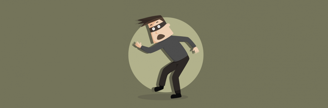An illustration of a surprised hacker caught by a spotlight.