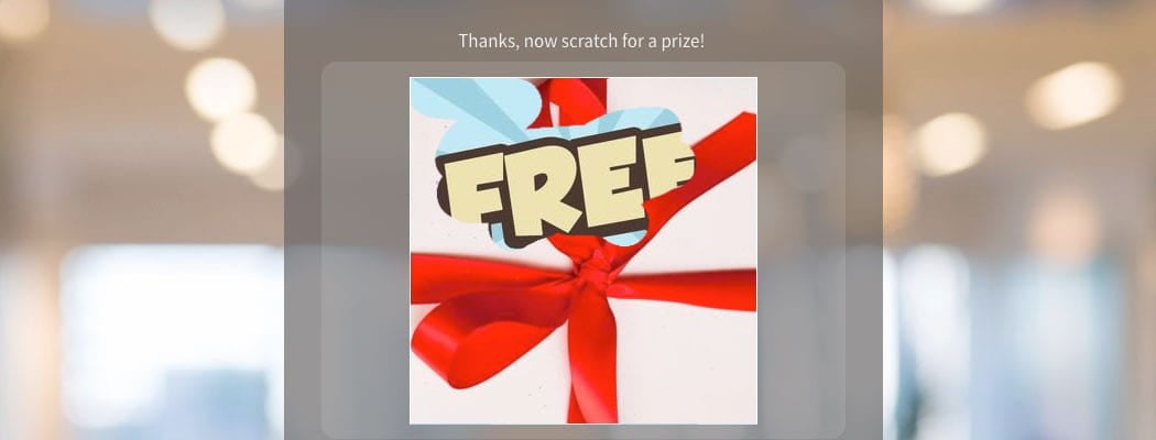 A web scratch card revealing the word "free."